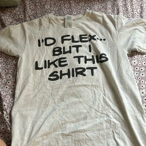 Men’s white small tee shirt.